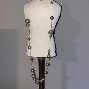 Gold tone beaded necklace